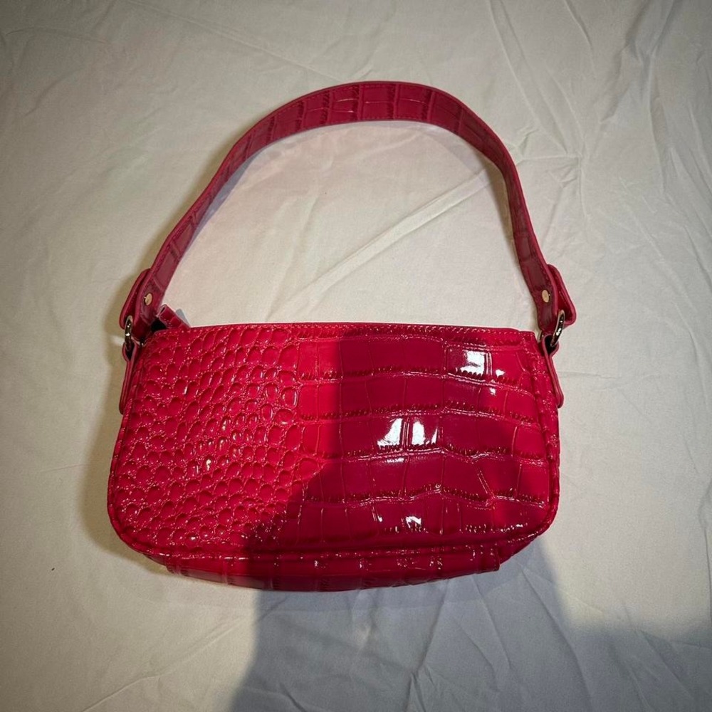 Hot pink crocodile print shoulder bag